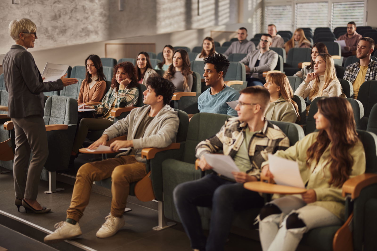 A female professor in a lecture hall