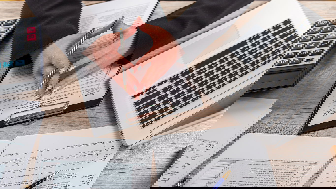 income-tax-austria.jpg Person with income tax documents